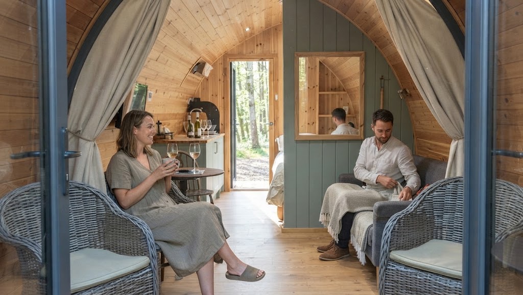 Architect-designed luxury glamping cabin with floor-to-ceiling glazing, private hot tub and Lake District fells beyond